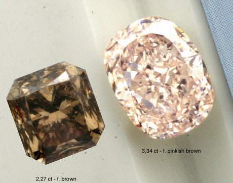 a brown diamond and a brownish pink diamond