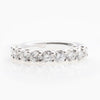 Shared prong wedding band