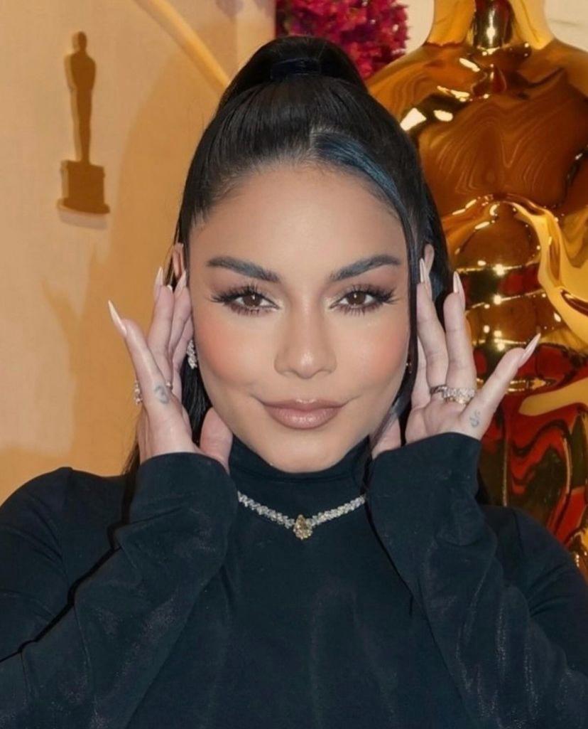 Vanessa Hudgens wearing a Yellow diamond necklace at the Oscars