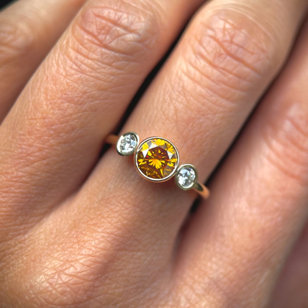 Yellow-Orange Three Stone Ring