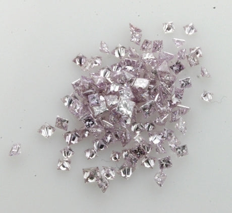 A lot of small square cut purple diamonds