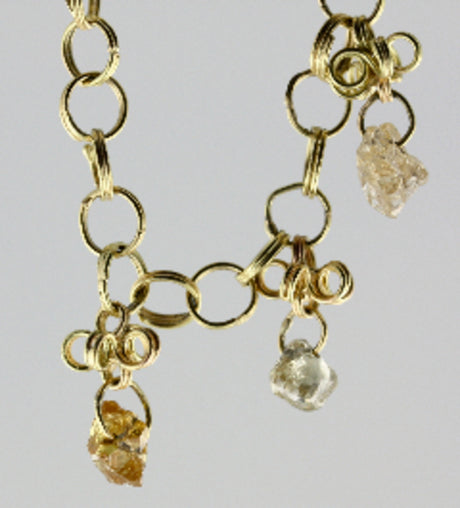 Jewellery with rough diamonds made by Anna Moltke-Huitfeld, Denmark