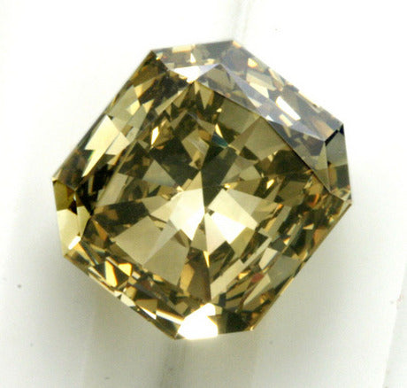 A very nice olive colour diamond, weighing 9,27 ct