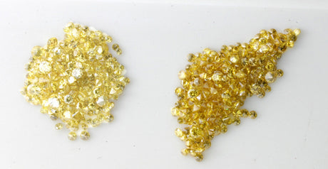 Very small yellow brilliants, in two different shades of yellow
