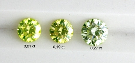 Three lime green diamonds