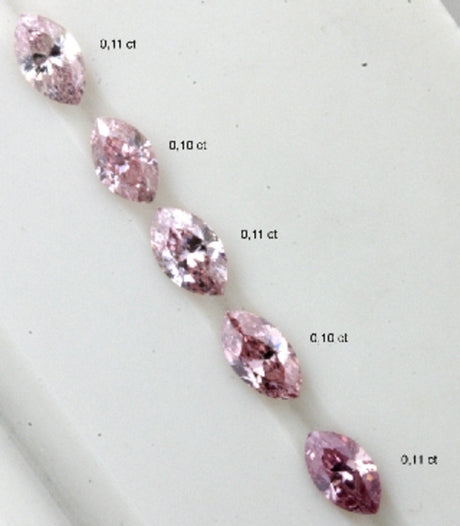 A serie of pink marquise diamonds, from light pink till deep pink
