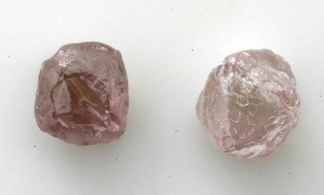 A brownish pink rough diamond and a nice pink rough diamond