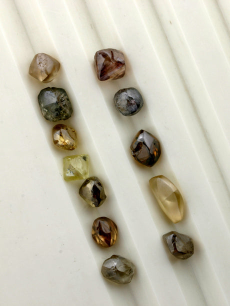 Different colored rough diamonds