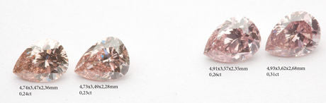 Two couples of pink pear shape diamonds