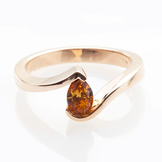 Cognac diamond tension set ring