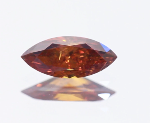 Fancy Brownish Orange diamond.